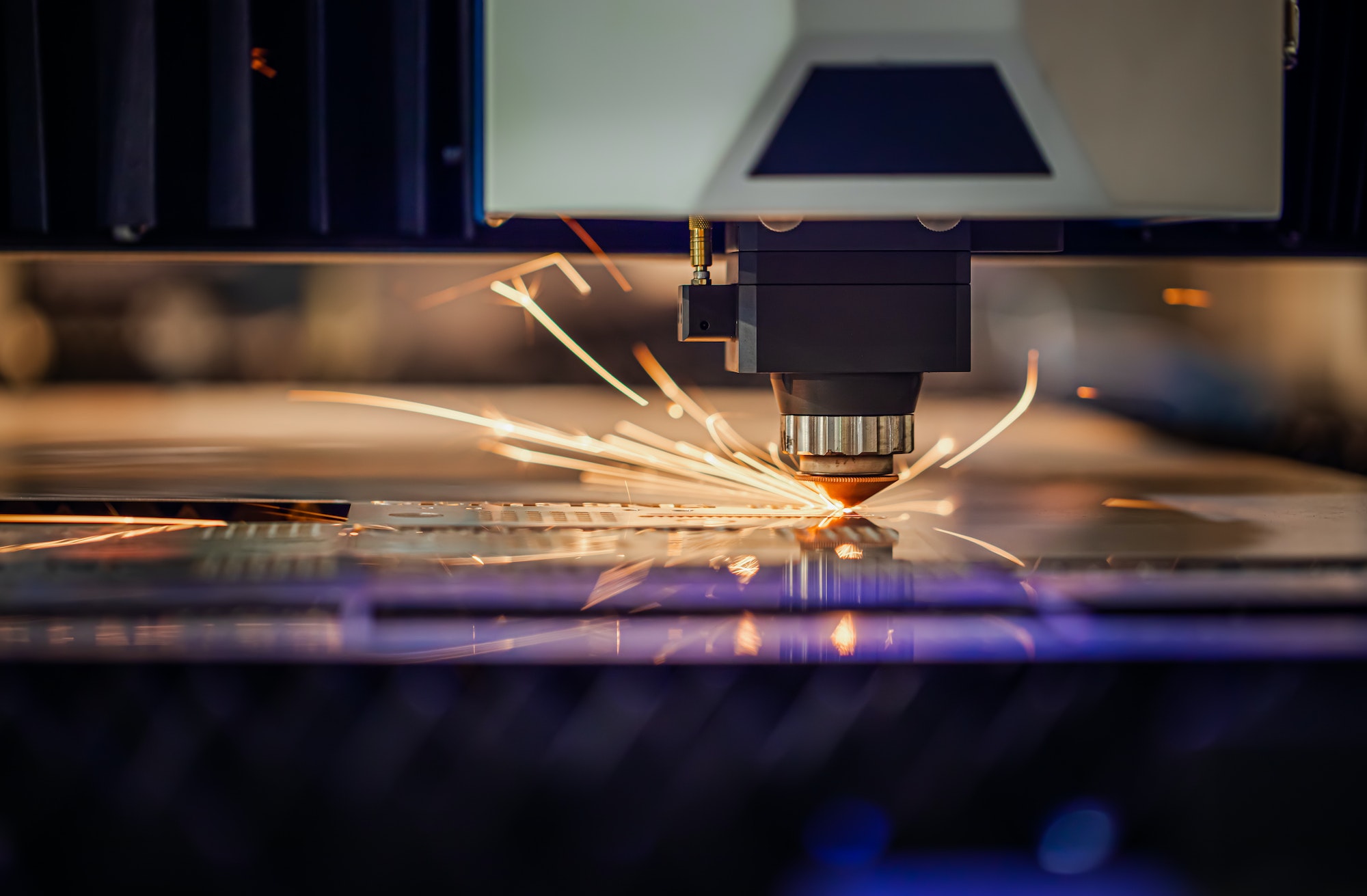CNC Laser cutting of metal, modern industrial technology.